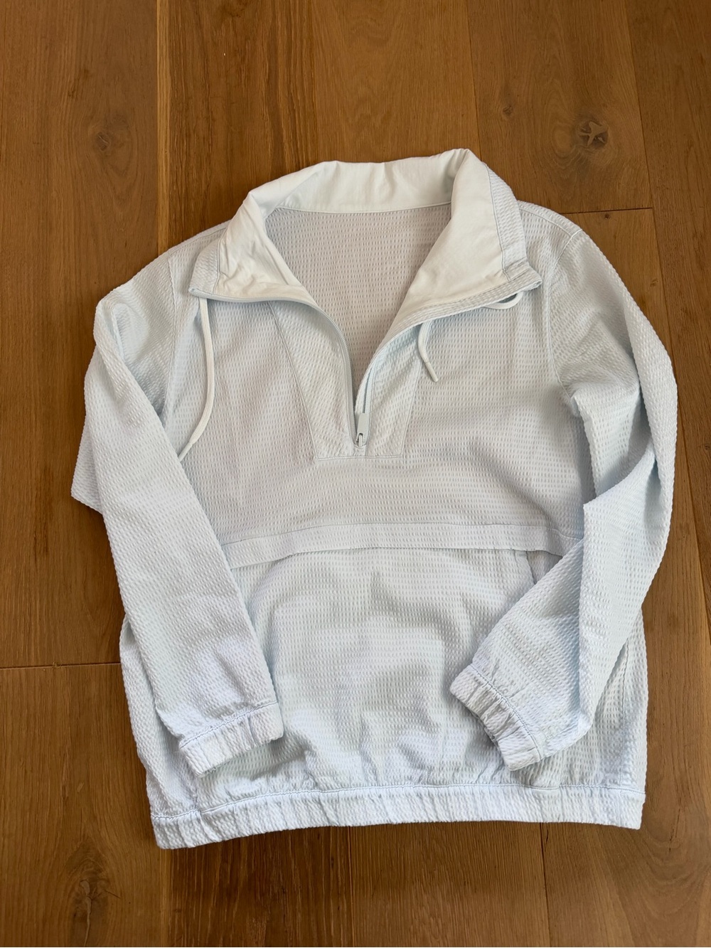 Light blue Lulu textured windbreaker